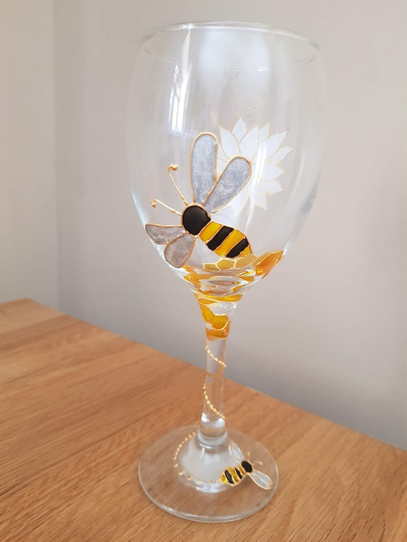 Hand painted wine glass with unique bumble bee flower design - etsy