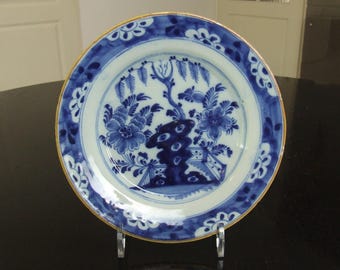 18th century Delft plate with fenced off garden