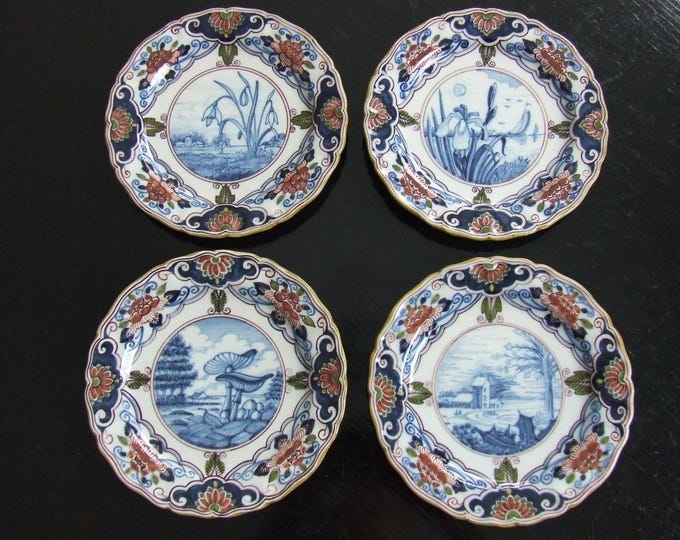 Tichelaar Makkum set of four Delft style handpainted polychrome season wall plates (tin glaze)