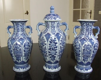 Large blue and white transferware porcelain garniture set with dragon handles