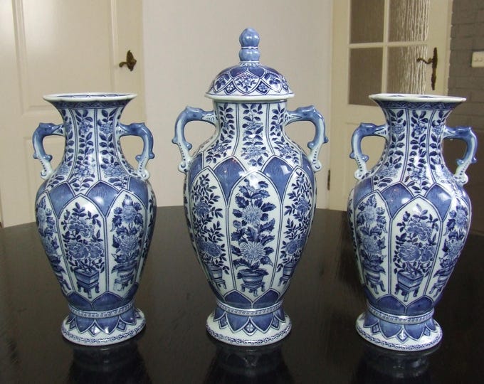 Large blue and white transferware porcelain garniture set with dragon handles