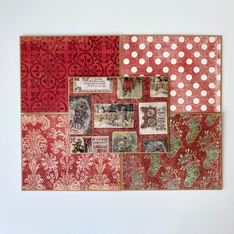 May include: A collage of six patterned paper squares in shades of red and white. The papers feature a variety of designs, including polka dots, damask, and a Christmas-themed pattern with holly and stockings. The papers are arranged in a grid pattern, with the polka dot paper in the top right corner.