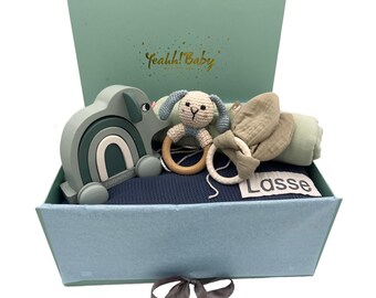 Baby gift with wooden toy and blanket with name