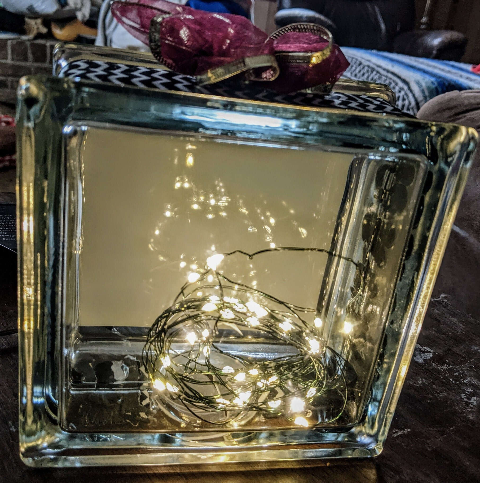 A Battery Fairy Light Glass Block of a Picture of a Old Red Truck Next