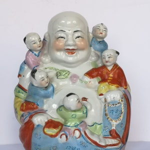 A Republic Period Chinese Porcelain of A Seated Hotei Buddha With Five ...