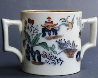 A Bow Porcelain Two Handled Cider Mug, Oriental Scenes Circa 1760's
