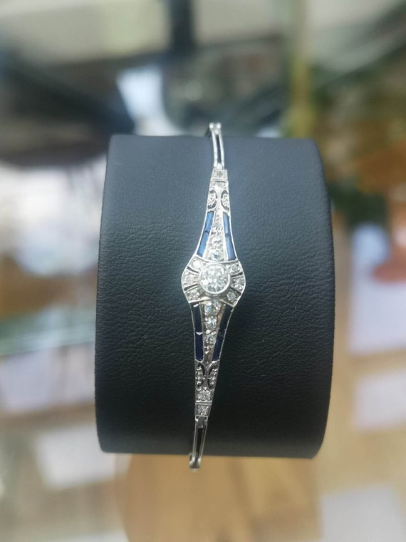 An Art Deco Old Mine Cut Diamonds & Sapphire Brace