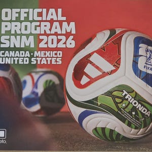 May include: A white soccer ball with red, blue, and green graphic patterns, featuring the text TRIONDA PRO and a FIFA logo. The background displays the text OFFICIAL PROGRAM SNM 2026 CANADA MEXICO UNITED STATES and a Mexico national team emblem.