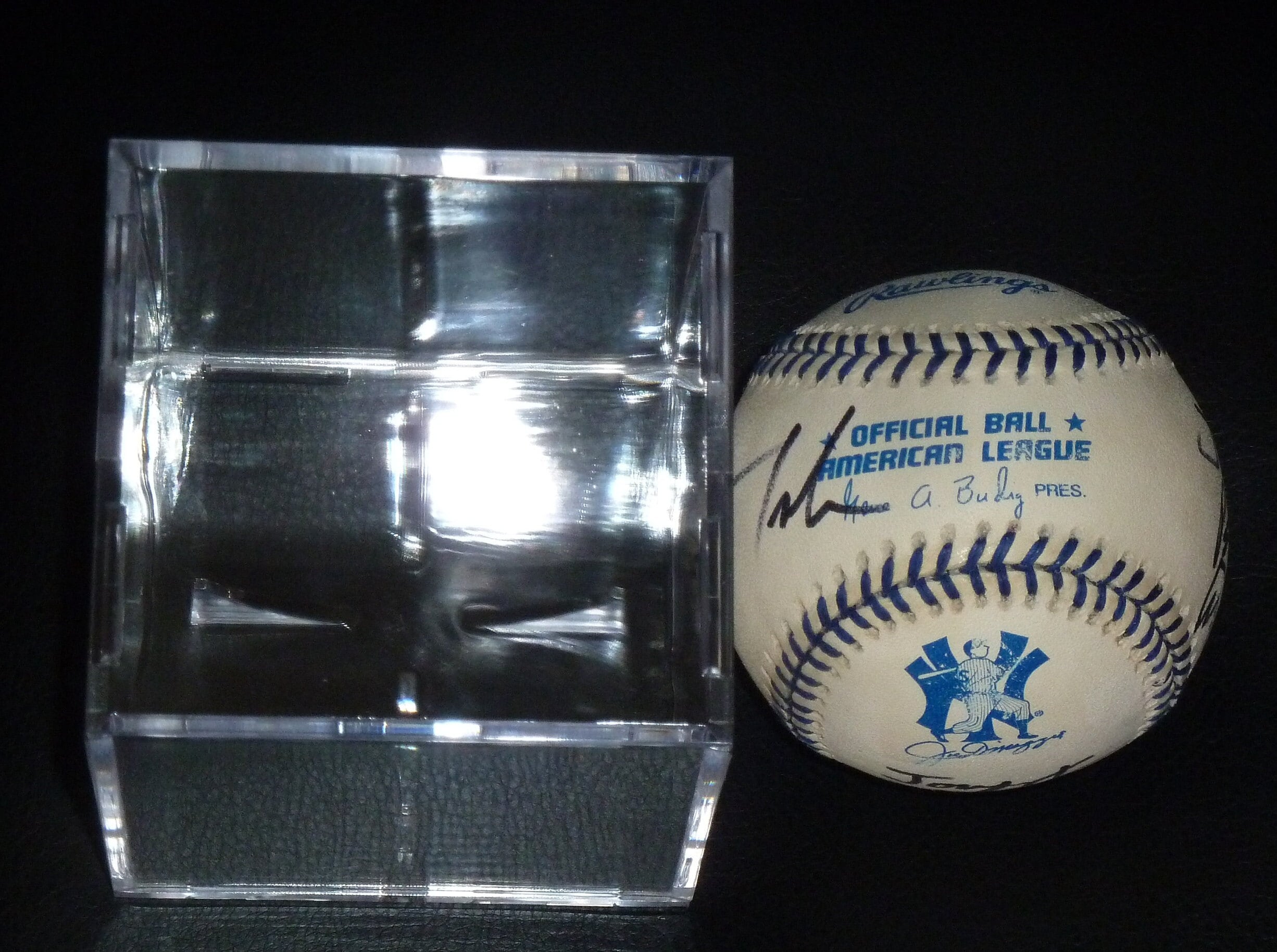 AEROSMITH group signed  one of a kind baseball with display case and Certificate Of Authenticity