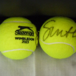 IGA SWIATEK Autographed 2023 Wimbledon dated tennis ball plus free handmade ball stand