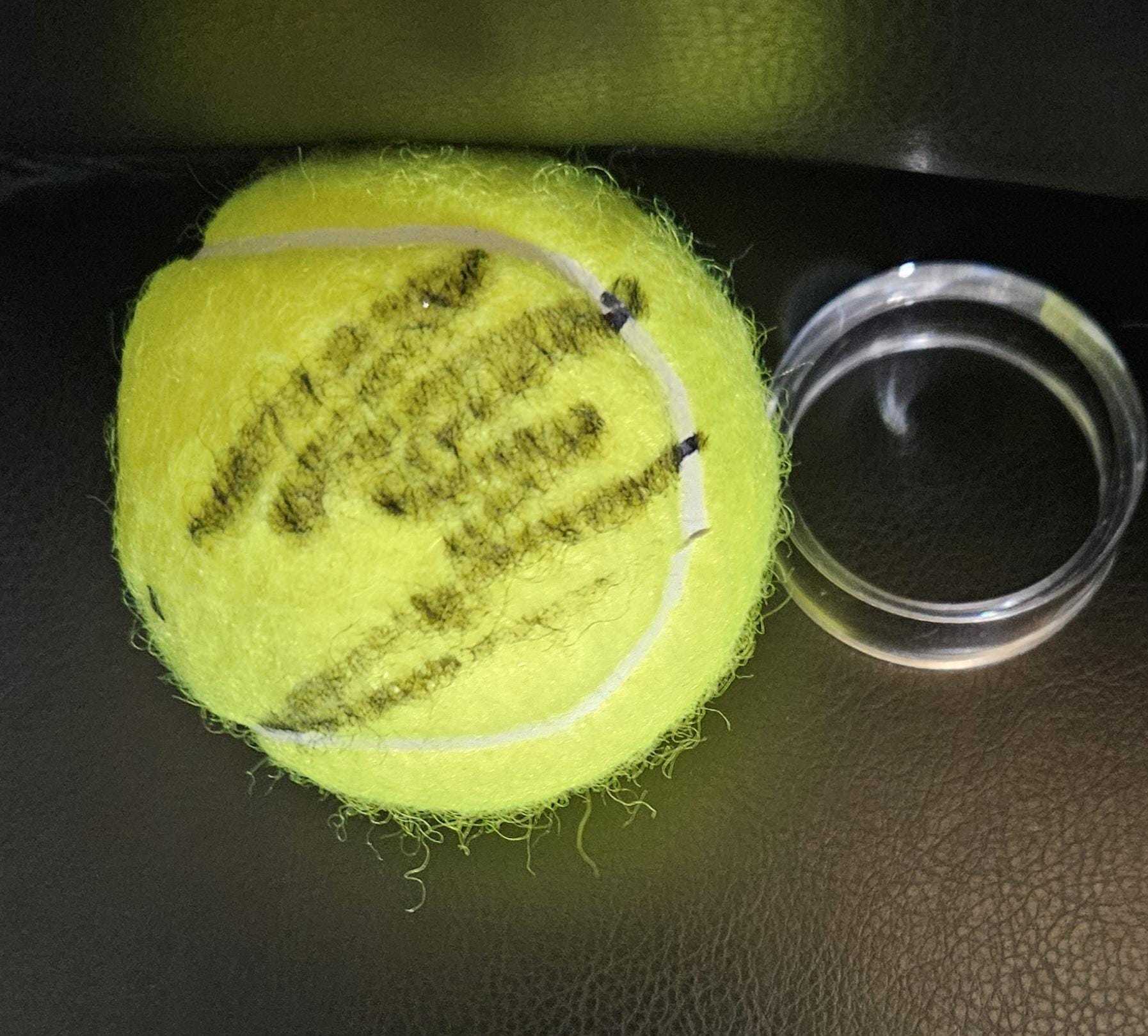 ニック・キリオスの直筆サイン入り全豪オープンテニスボールと無料の