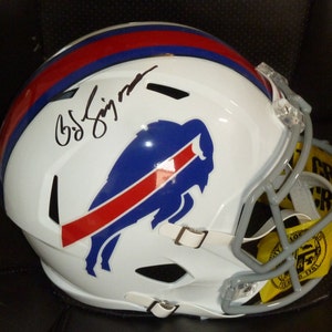 O.J. SIMPSON autographed Buffalo Bills full size replica  helmet with authentic LA Police tape in facegard plus JSA cert