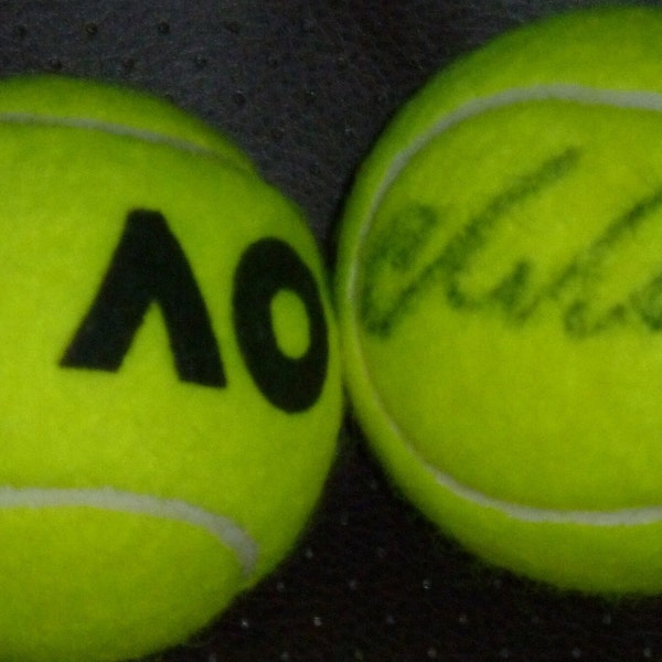 DANIIL MEDVEDEV autographed Australian Open tennis ball with COA and free handmade ball stand.