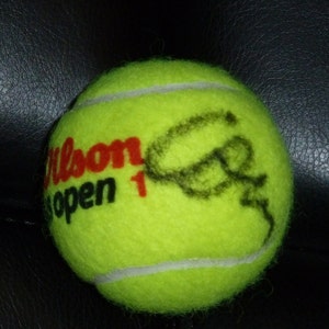 COCO GAUFF  Autographed US Open tennis  ball plus free handmade plastic ball stand.
