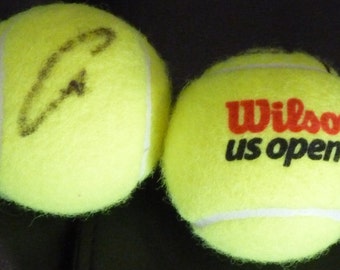 CARLOS ALCARAZ autographed Us open tennis ball with COA an free handmade ball stand.