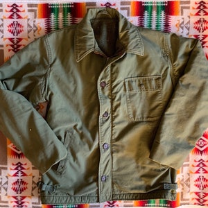 Vintage Vietnam era USN A-2 Deck Jacket stencil the  back