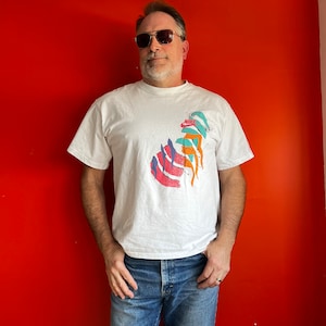 Vintage 80s Nike graphic t shirt made in USA single stitch Large