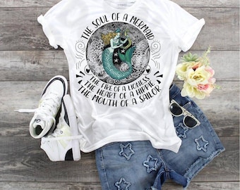 Soul Of A Mermaid,  Fire Of A Lioness, The Heart Of A Hippie, The Mouth Of A Sailor design Tee t-shirt. Bella Canvas