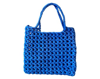 Stylish self-crocheted bag in royal blue