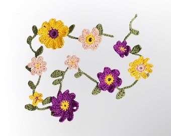 Flower hair garland crocheted and embroidered with beads