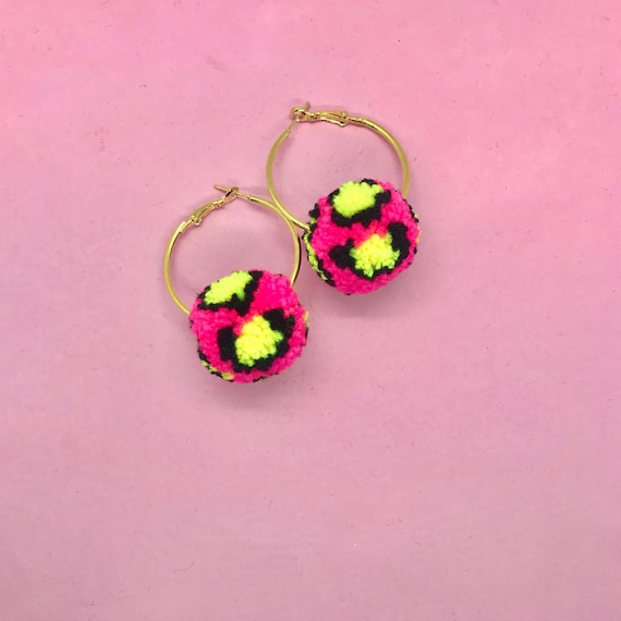 Leopard pom pom sale earrings