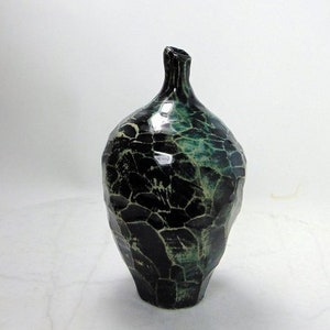 Small Decorative Wheel Thrown Hand faceted Bottle