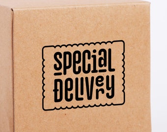 May include: A brown cardboard box with a black label that says "special delivery" in a decorative font.