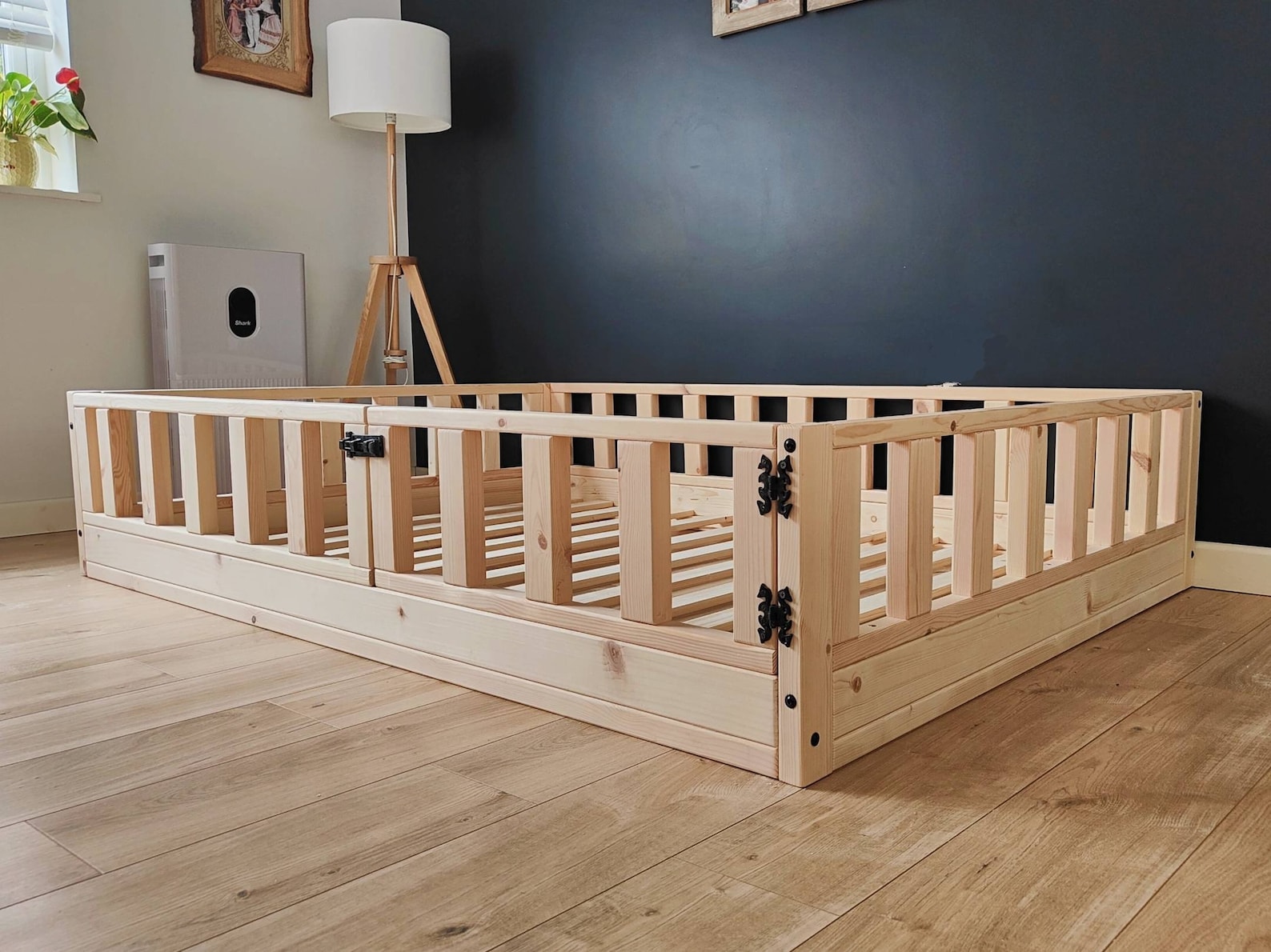 Wooden Montessori bed with safety rails