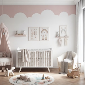 May include: A nursery room featuring a white crib with a patterned blanket, a pink canopy, a cream armchair with a gray throw, two wall shelves with small animal figurines, three framed wall prints, and a round floral rug with wooden toys.