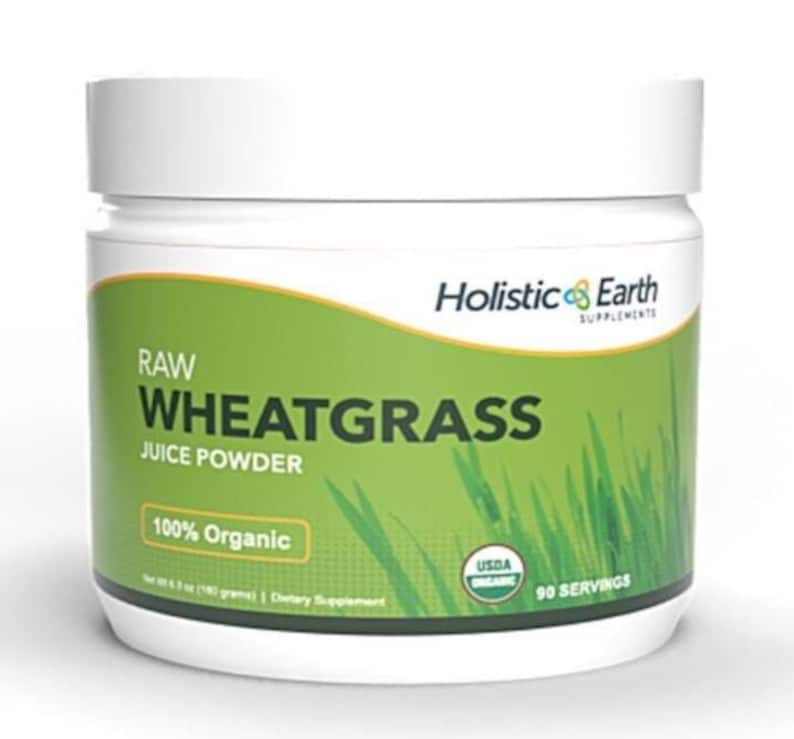 May include: A white plastic container of Holistic Earth Raw Wheatgrass Juice Powder. The label is green with white text that reads "RAW WHEATGRASS JUICE POWDER" and "100% Organic". The container also has the USDA Organic seal and states "90 Servings".
