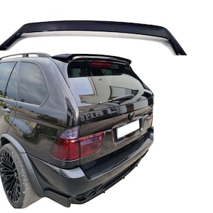May include: Black rear spoiler for a BMW X5 SUV. The spoiler is made of high-quality ABS plastic and is designed to improve the vehicle's aerodynamics and handling.