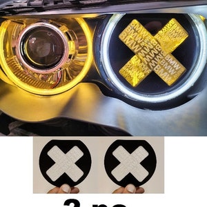Cruces decorativas para faros de BMW E46 (2 unidades)