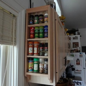 Cabinet end mounted wood spice rack