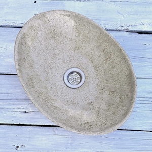 Oval ceramic washbasin