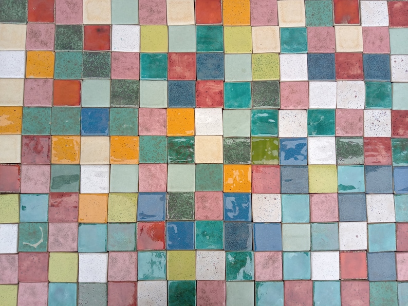 May include: A colorful mosaic tile pattern with a variety of colors including red, green, blue, yellow, and white.