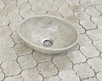 Lavabo ovalado para baño, hecho a mano.