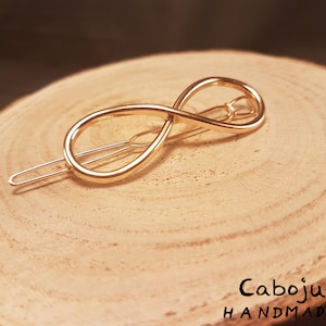 Filigree hair clip infinity gold/silver