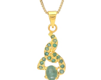 May include: A gold pendant necklace featuring a green emerald gemstone, surrounded by smaller green emeralds. The pendant is shaped like a swirl.