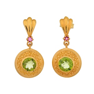 May include: Gold earrings with a green gemstone and a pink gemstone accent.