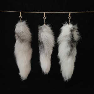soft tanned clip on fox tail keychain, suitable for cosplay.