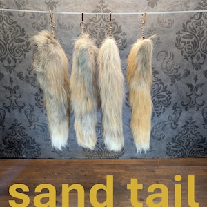 Llavero con clip de cola de zorro de color bronce suave, adecuado para cosplay.