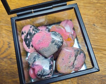 Rhodonite heart, made from natural crystal.