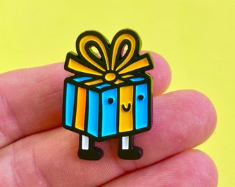 a pin of a present, enamel pin, gift