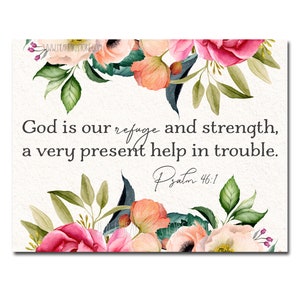 May include: A floral print art print with the text "God is our refuge and strength, a very present help in trouble. Psalm 46:1." The artwork features watercolor flowers in shades of pink, peach, and green, arranged around the text.