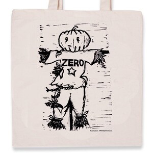 May include: A black and white illustration of a scarecrow with a pumpkin head wearing a shirt that says "ZERO" with a star. The scarecrow is standing on a wooden post.