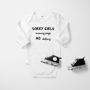 A whimsical and heartwarming outfit that is perfect for your little one's very first birthday. Crafted from ultra-soft cotton, this onesie promises to keep your baby cozy and comfortable. Available in both long and short sleeves.