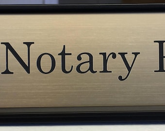 Attractive Gold Notary Desk Sign. This Notary Desk Sign tells everyone you are a proud notary! An excellent addition to a notary's supplies.