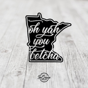 May include: Black and white sticker of the state of Minnesota with the text "oh yah you betcha" in a white cursive font.