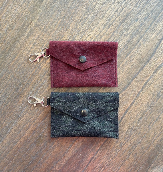 Coin purse with leather lace