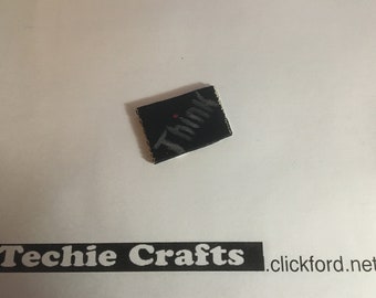 Micro sized "Think" signage